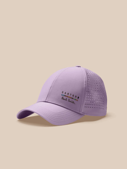 Purple baseball cap with brand logo on a beige background