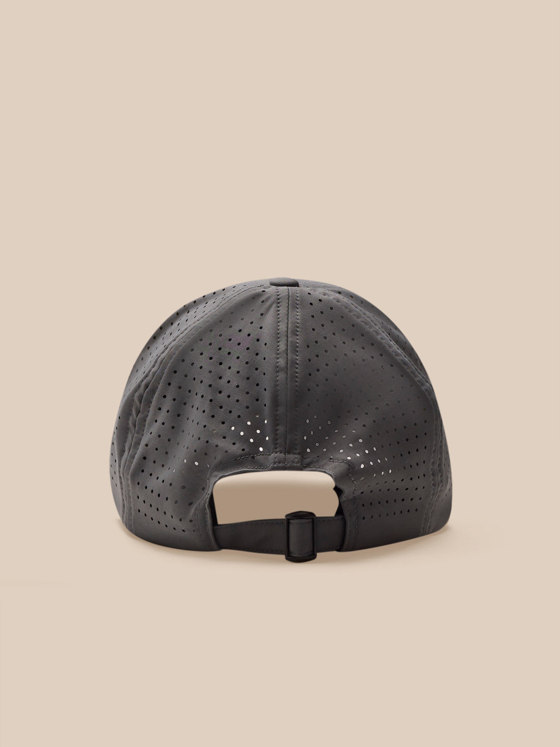 Grey cap with a beige patch on a beige background