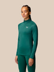 Model in seafoam Adapt Training half zip top with standing collar and long sleeves