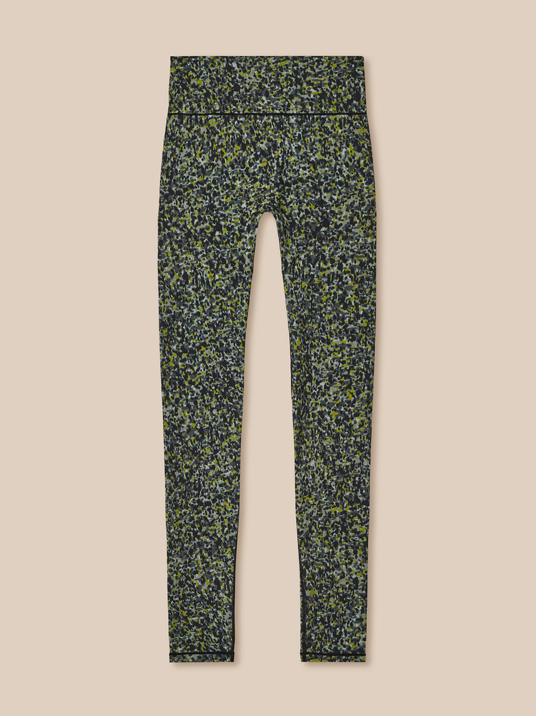 Floral-patterned leggings on a beige background