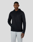 Male model wearing black Flex Hoodie 3.0 with hood and subtle chest branding