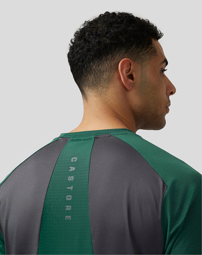 Back view of green Apex Aeromesh T-Shirt with aeromesh back panel and vertical Castore branding on the stripe
