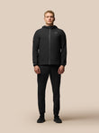 Male model in black Flex lightweight joggers with an elastic waistband and zip pockets