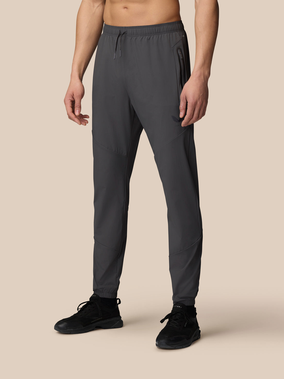 Front view of gunmetal Flex Classic joggers with drawstring waistband and zip pockets