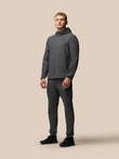 Male model wearing a grey Flex Classic Set Woven jacket and matching joggers.