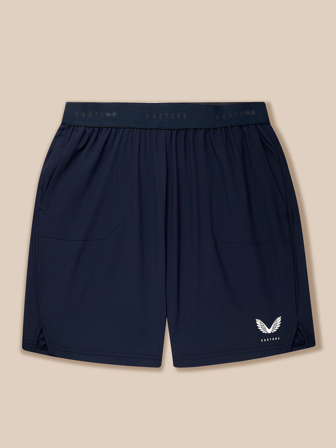 Navy blue shorts with a logo on a beige background
