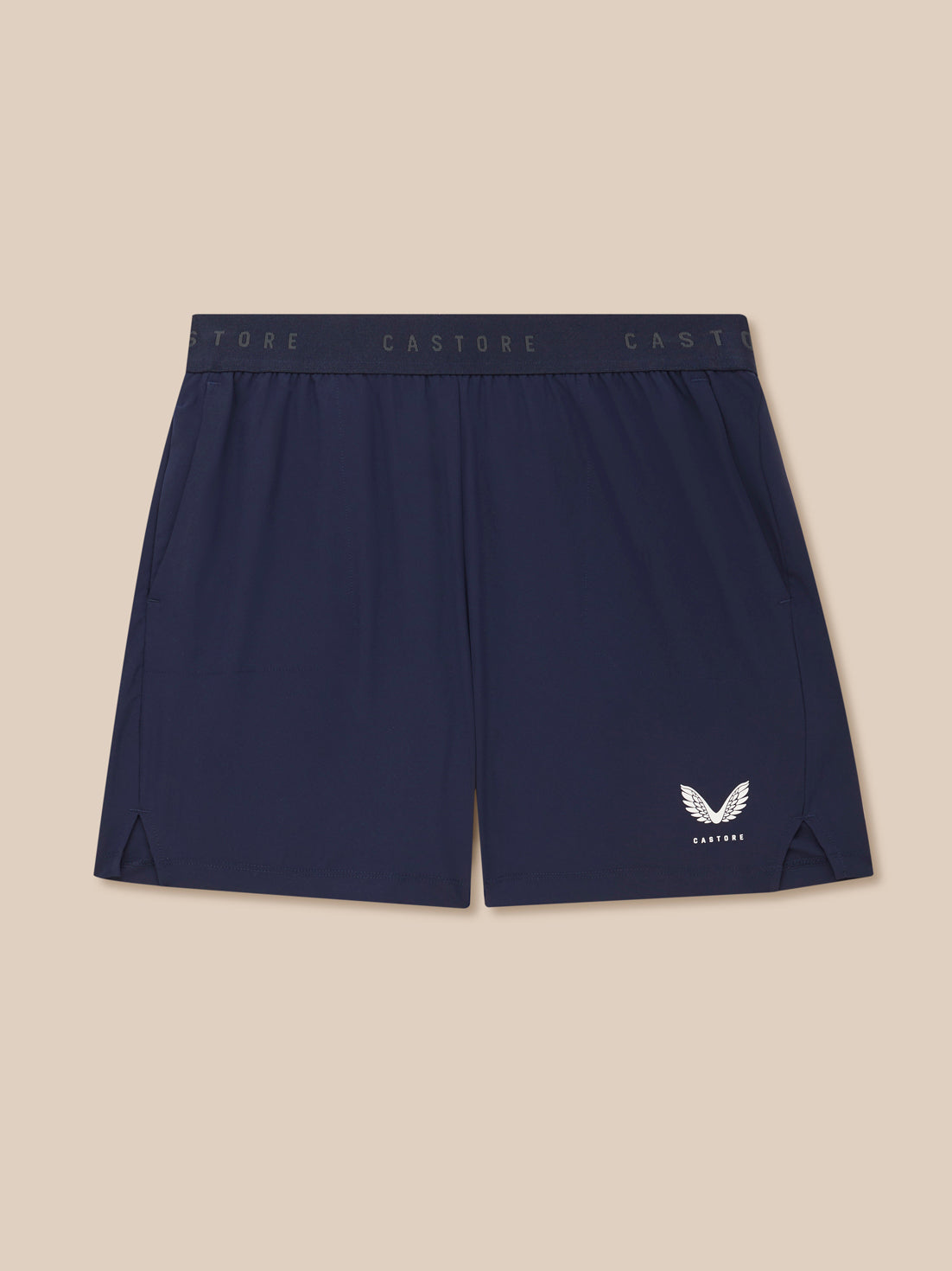 Navy shorts with a brand logo on a beige background