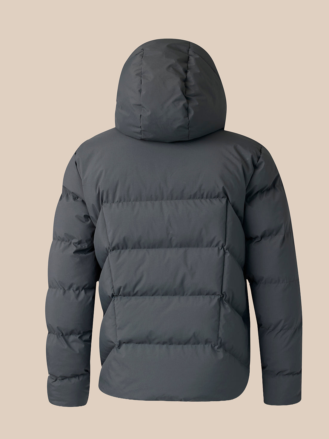Back view of charcoal Castore x Paul Smith quilted puffer jacket with hood and horizontal baffle quilting.