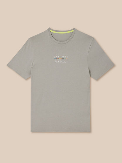 Gray t-shirt with a brand logo on a beige background