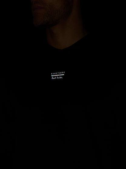 Black t-shirt with white text on a dark background