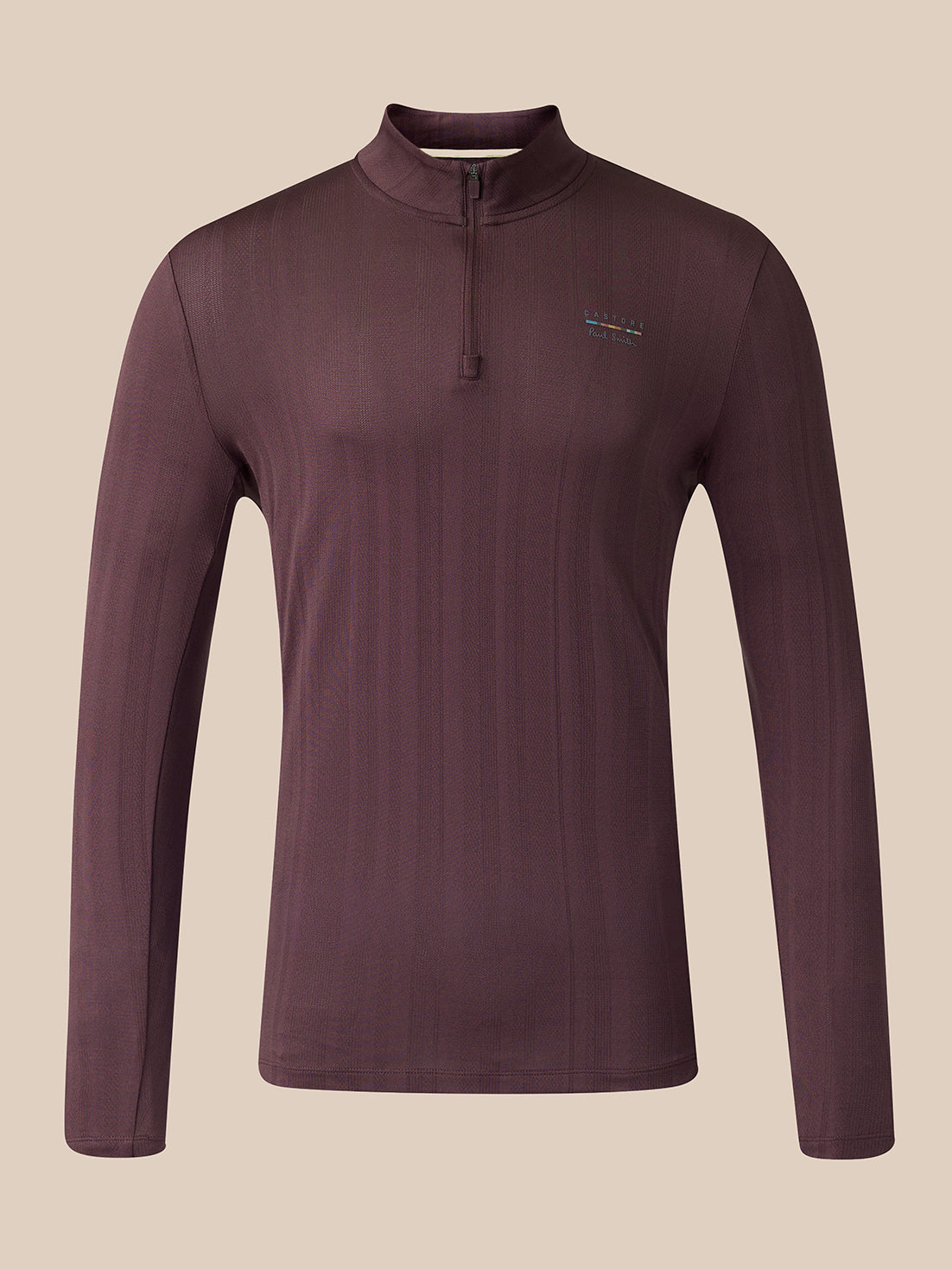 A long-sleeve quarter-zip athletic top shown from the front, in a dark plum-brown color with a small vertical multicolor logo near the upper back, set against a solid beige background.