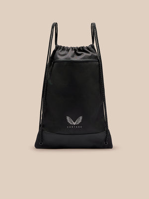 Front view of black gym sack with drawstring straps and Castore logo.