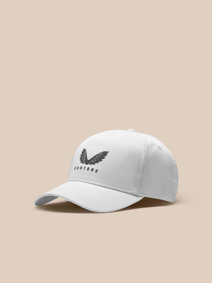 White Castore cap with wing logo on the front halo eyelets and adjustable back fastener