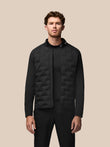 Black Pinnacle Golf Jacket with quilted front panels stand collar and Castore branding