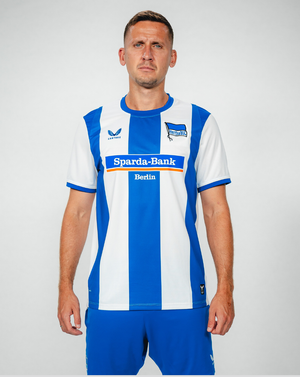 Front view of Hertha BSC 26/27 home shirt with blue and white vertical stripes and sponsor logo.