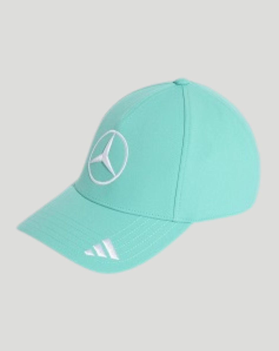 A mint green baseball cap featuring the white Mercedes-Benz star logo on the front and the white Adidas three-stripe logo on the brim, set against a solid light gray background.