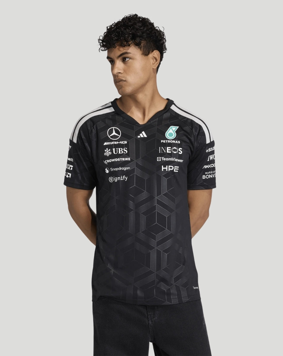 Black Mercedes AMG Petronas driver T shirt with team sponsor logos across the chest and white shoulder stripes.
