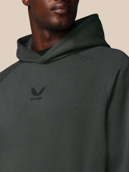 Dark gray hoodie with a brand logo on a beige background