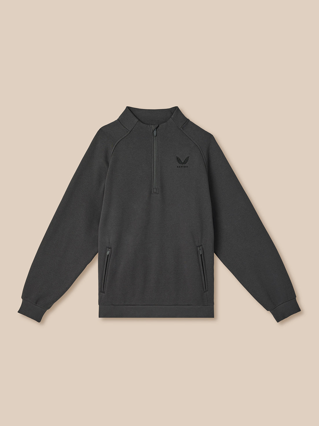 Dark gray sweatshirt with a small logo on a beige background