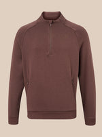 A men's brown quarter-zip pullover sweatshirt with a small tonal embroidered logo on the left chest, displayed on a neutral beige background.