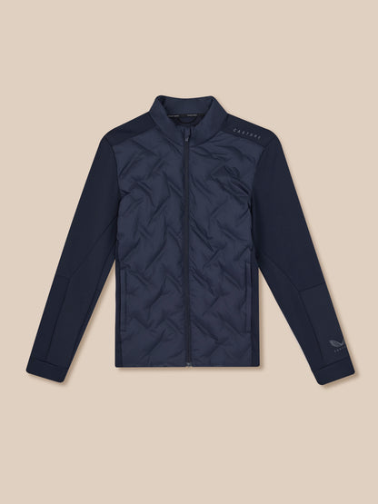 Navy quilted jacket on a beige background