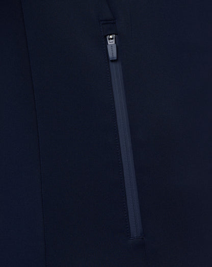 Close-up of a navy blue zipper on a dark background