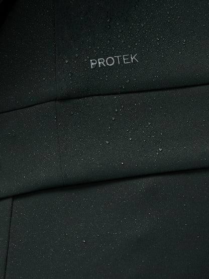 Close-up of a black fabric with 'PROTEK' branding.