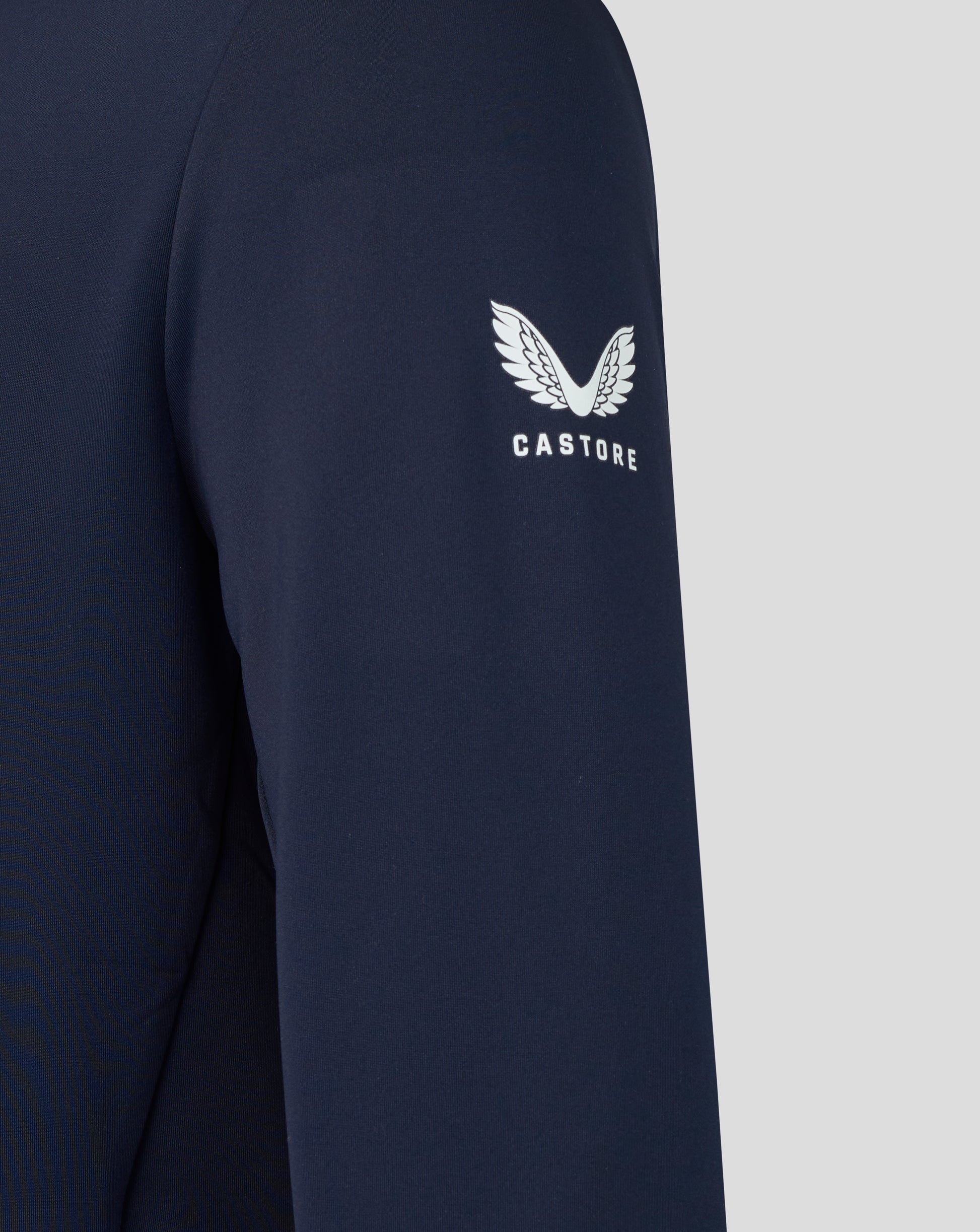Navy long-sleeve shirt with the Castore logo on a light gray background