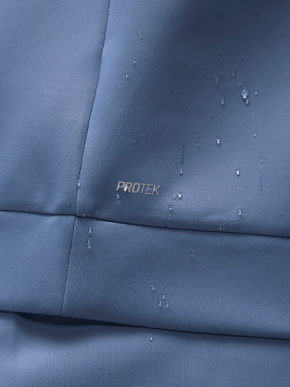 Close-up of Moonlight Blue Flex Sweatshirt fabric with PROTEK watermark and water droplets