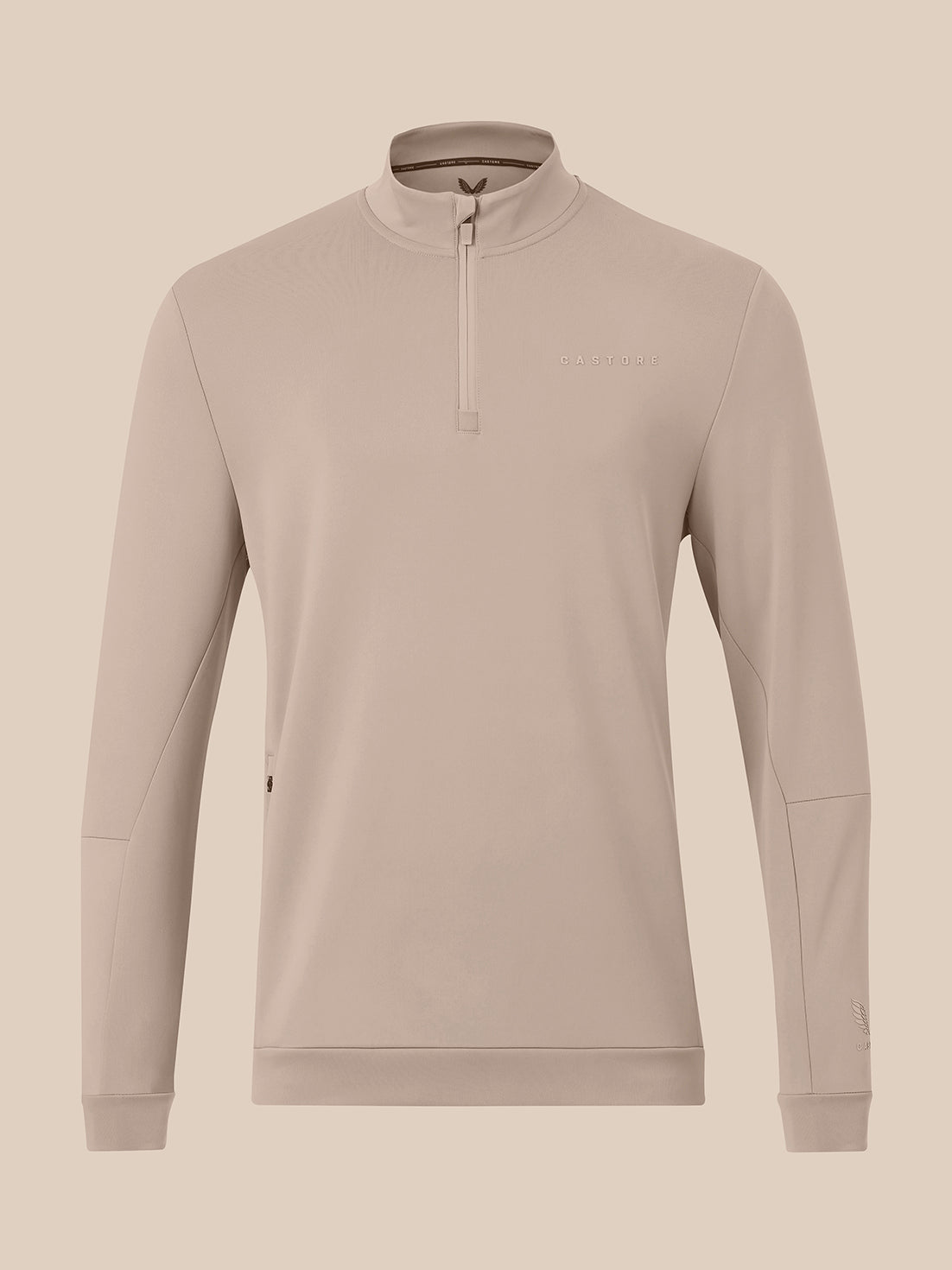 Taupe men's flex long sleeve quarter zip top with Castore logo on chest and zip pockets