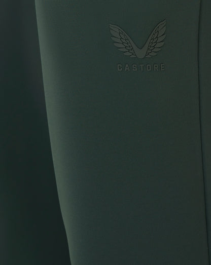 Dark green product with 'CASTORE' branding on a dark background