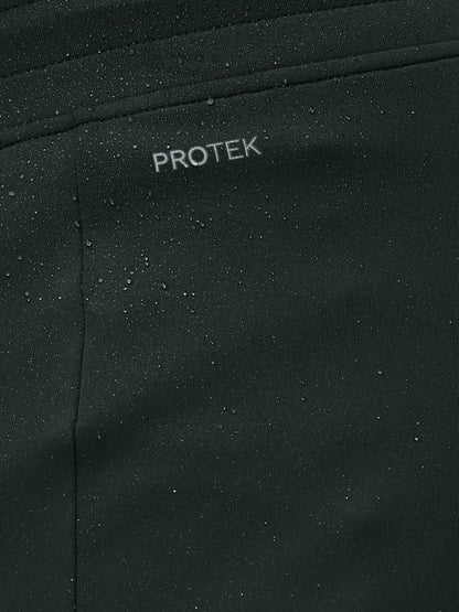 Close-up of black fabric with 'PROTEK' branding.