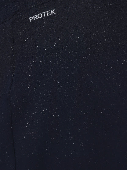 Close-up of a black textured fabric with 'PROTEK' branding.