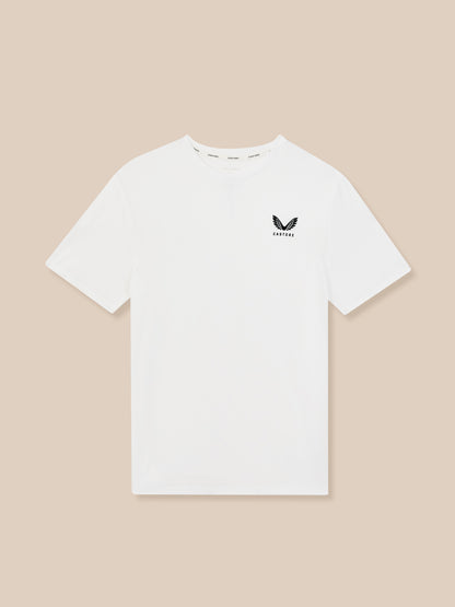 White t-shirt with a black logo on a beige background
