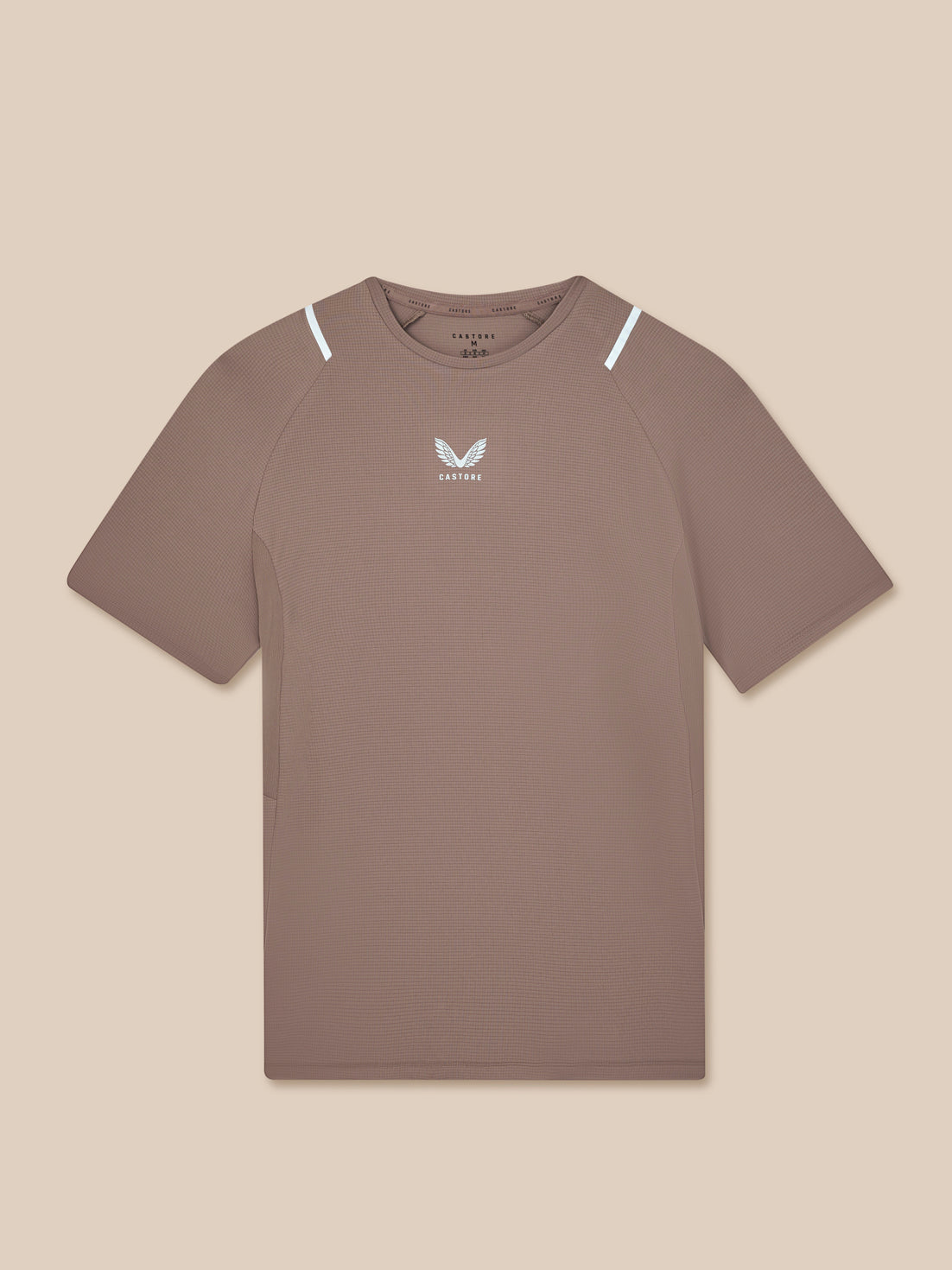 Brown t-shirt with a logo on a beige background