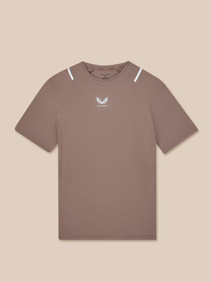 Brown t-shirt with a logo on a beige background