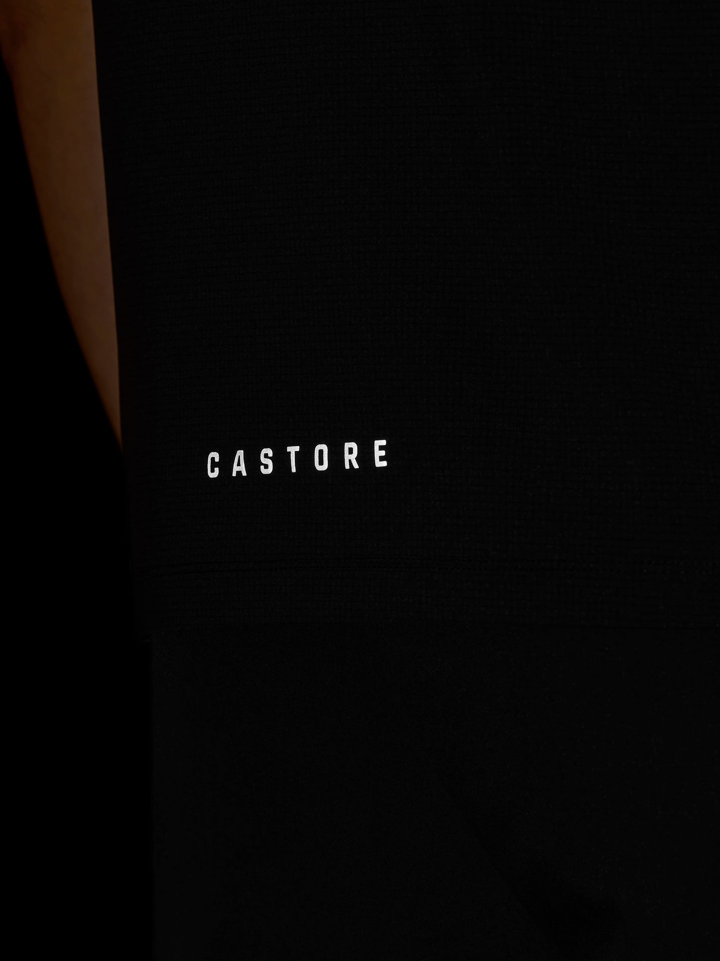 Black surface with 'CASTORE' branding in white text