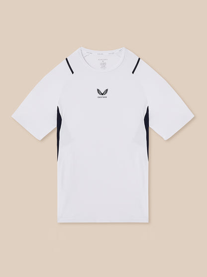 White t-shirt with black accents on a beige background