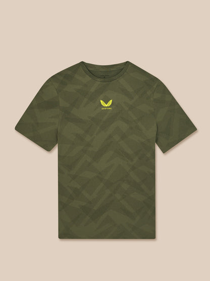 Green t-shirt with a logo on a beige background