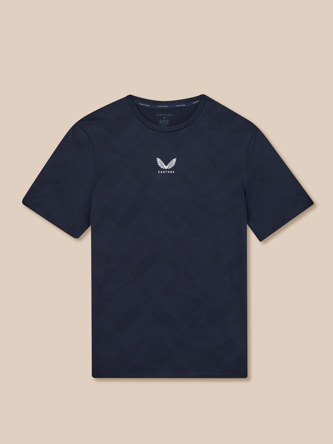 Navy t-shirt with a logo on a beige background