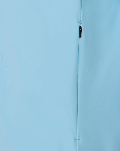 Close-up of a light blue fabric with a zipper running vertically.