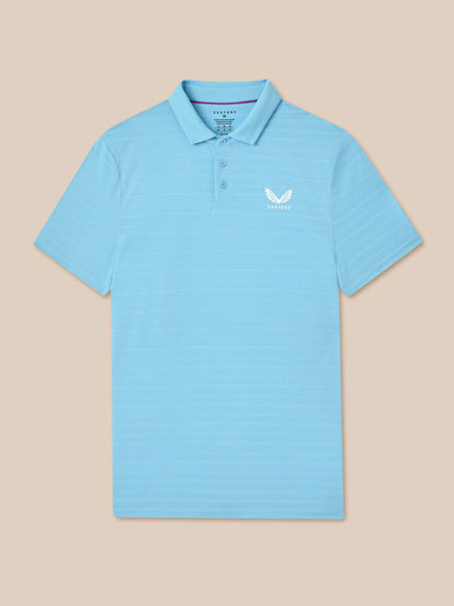 Light blue polo shirt with a small logo on a beige background