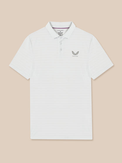 White polo shirt with a logo on a beige background