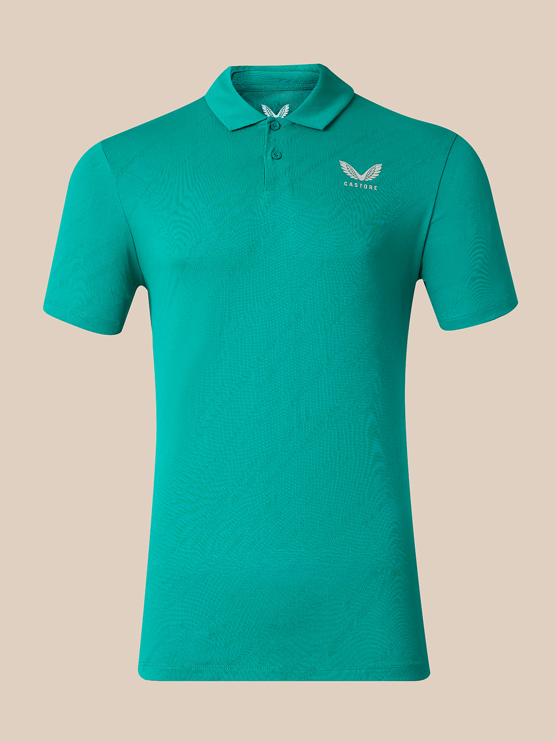 A short-sleeve polo shirt in a vibrant teal green color, featuring a subtle textured pattern and a small white wing logo with the brand name 'CASTORE' on the left chest, set against a solid beige background.