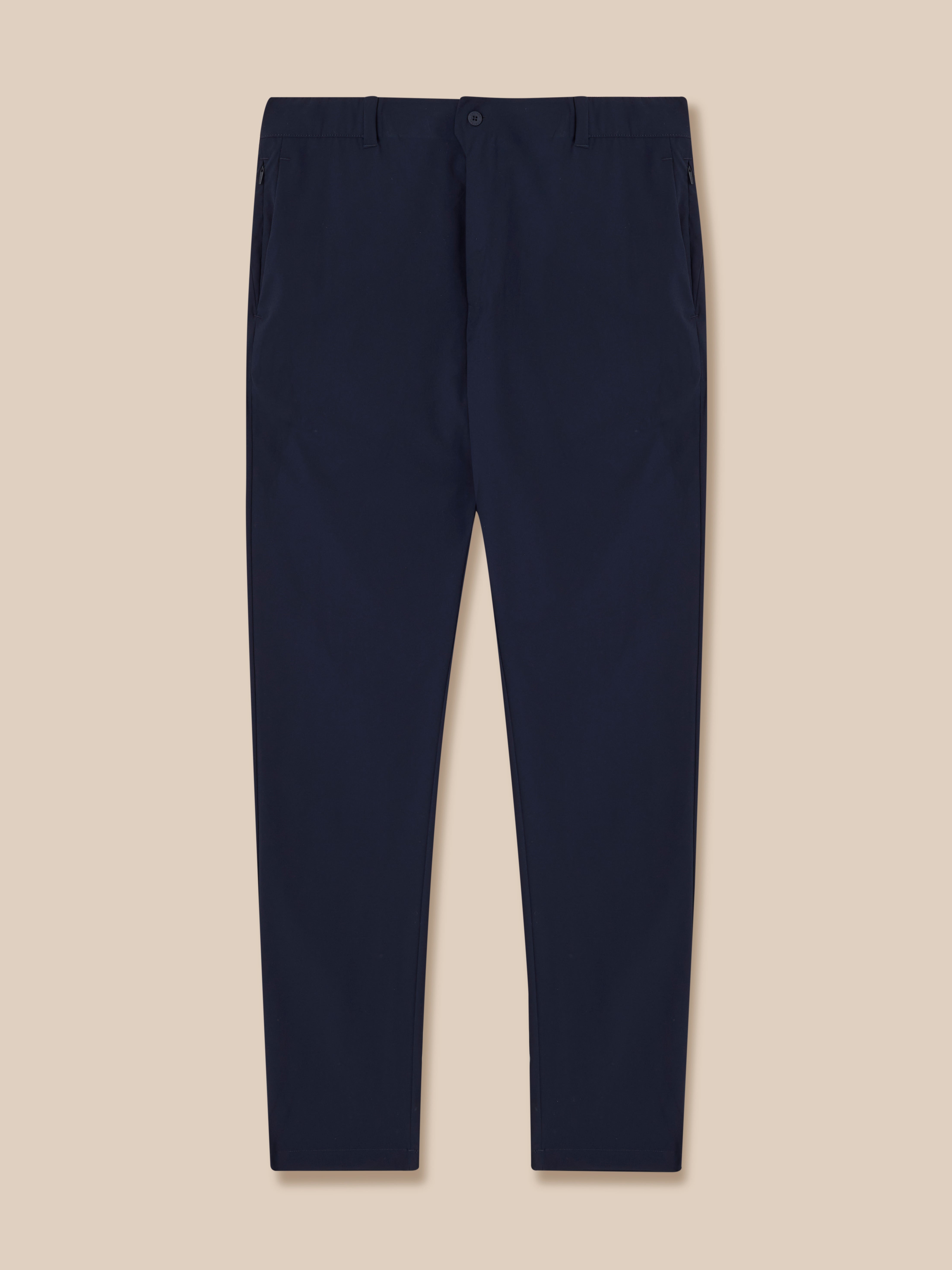 Navy men's golf trousers back view showing rear pockets and Castore branding