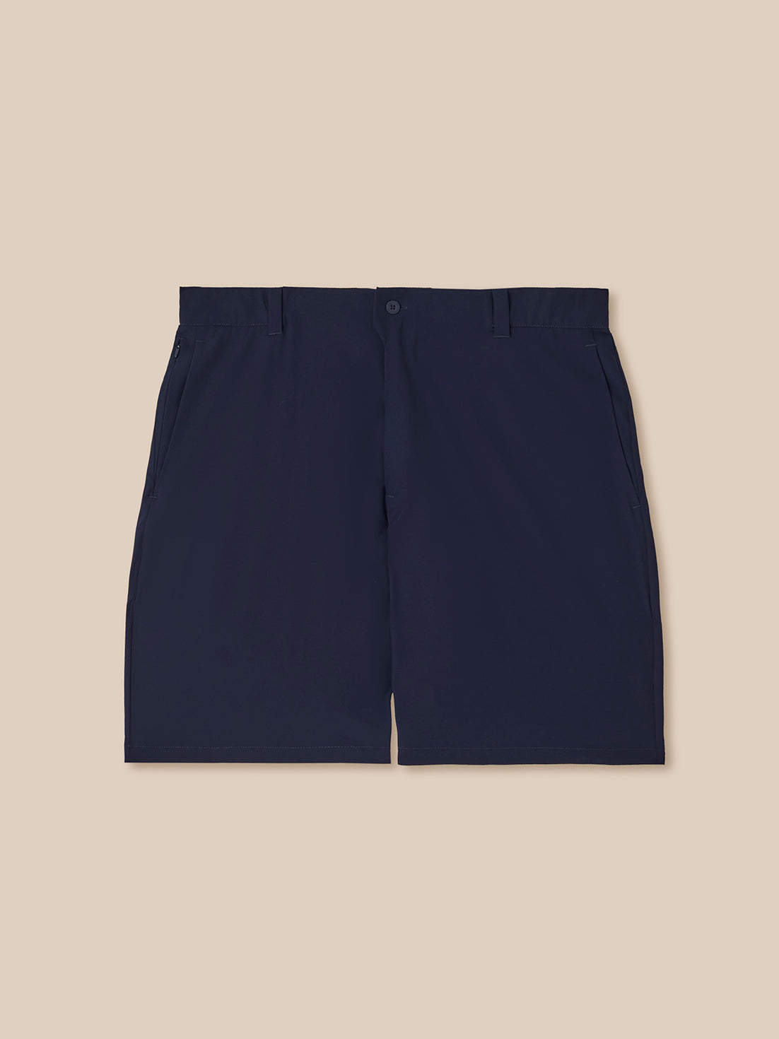 Navy blue shorts on a beige background