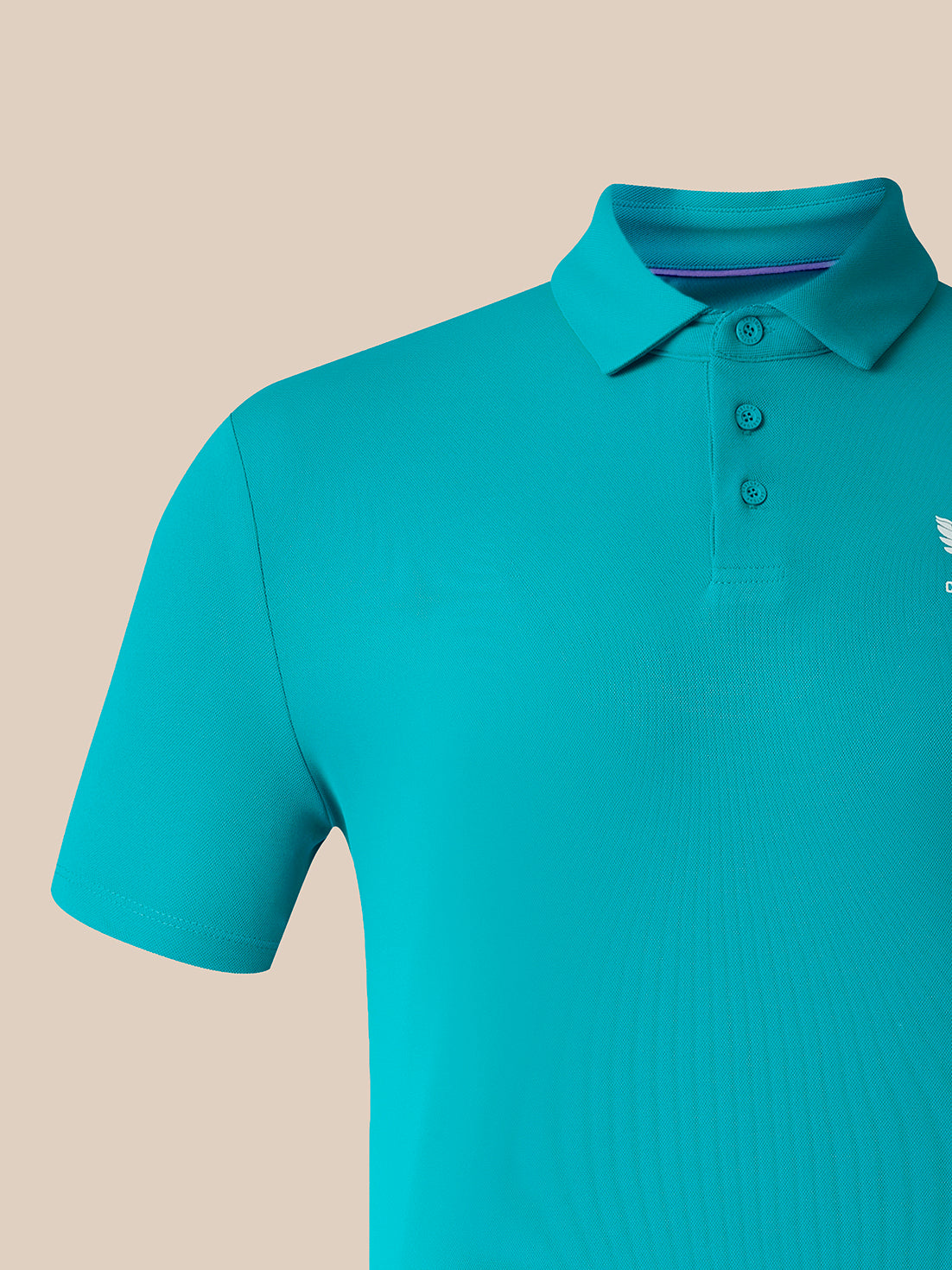 A close-up of a short-sleeve polo shirt in a bright turquoise color, featuring a three-button placket and a small white embroidered logo on the left chest, set against a solid beige background.
