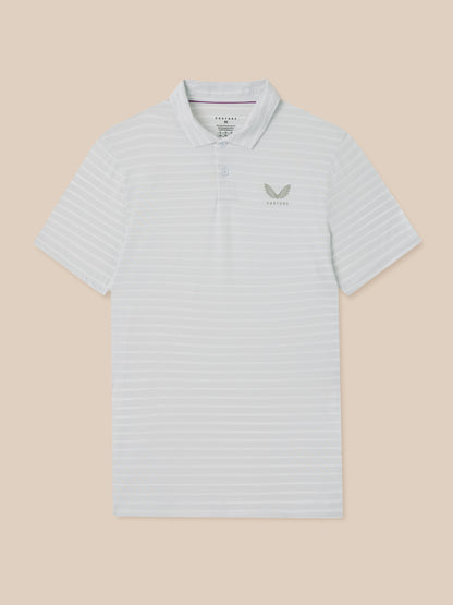 A short-sleeve polo shirt with fine horizontal stripes in white and light gray, featuring a small gray embroidered logo on the left chest, displayed against a solid beige background.