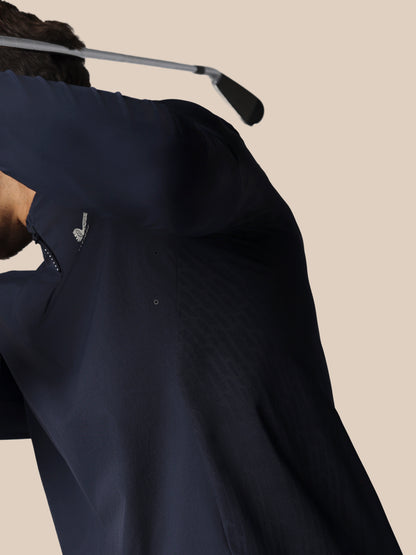 Navy blue shirt against a beige background