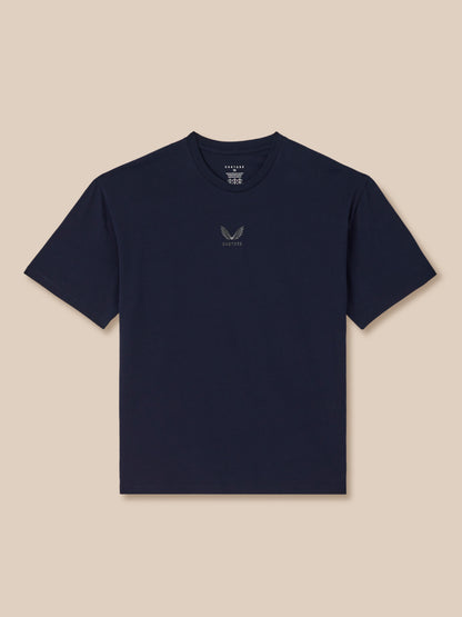 Navy blue t-shirt with a logo on a beige background